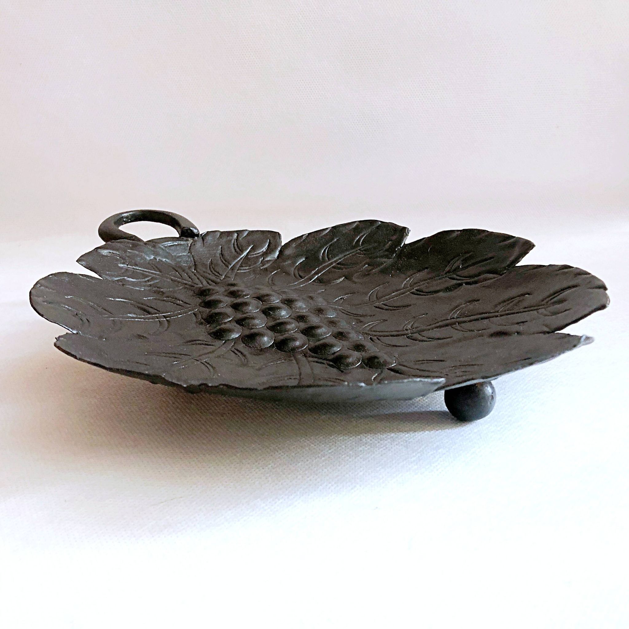 Artisanal embossed metal tripod dish