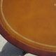 Small side table with an oval top in English style.