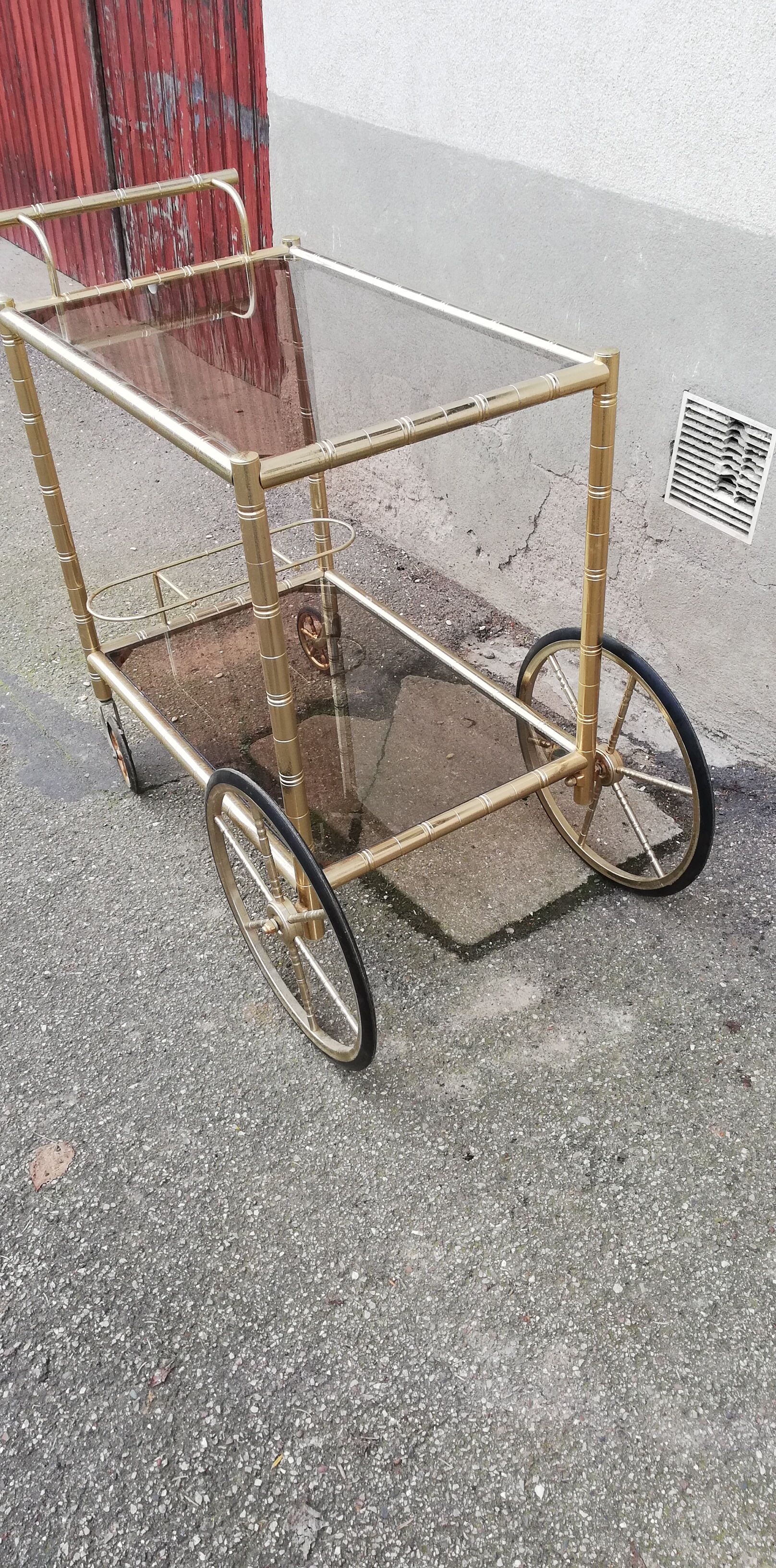 Vintage brass service 4 wheels