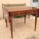 Louis XVI style table in rosewood with lemon tree inlay.