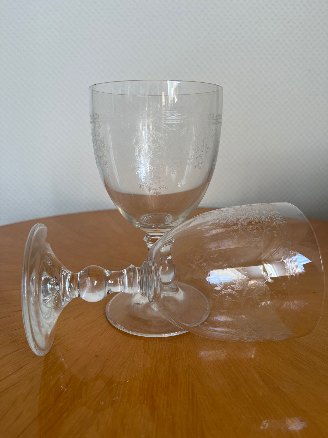 Set of two engraved glass wine glasses