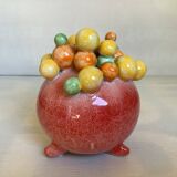 Small tripod vase with multicolored marbles