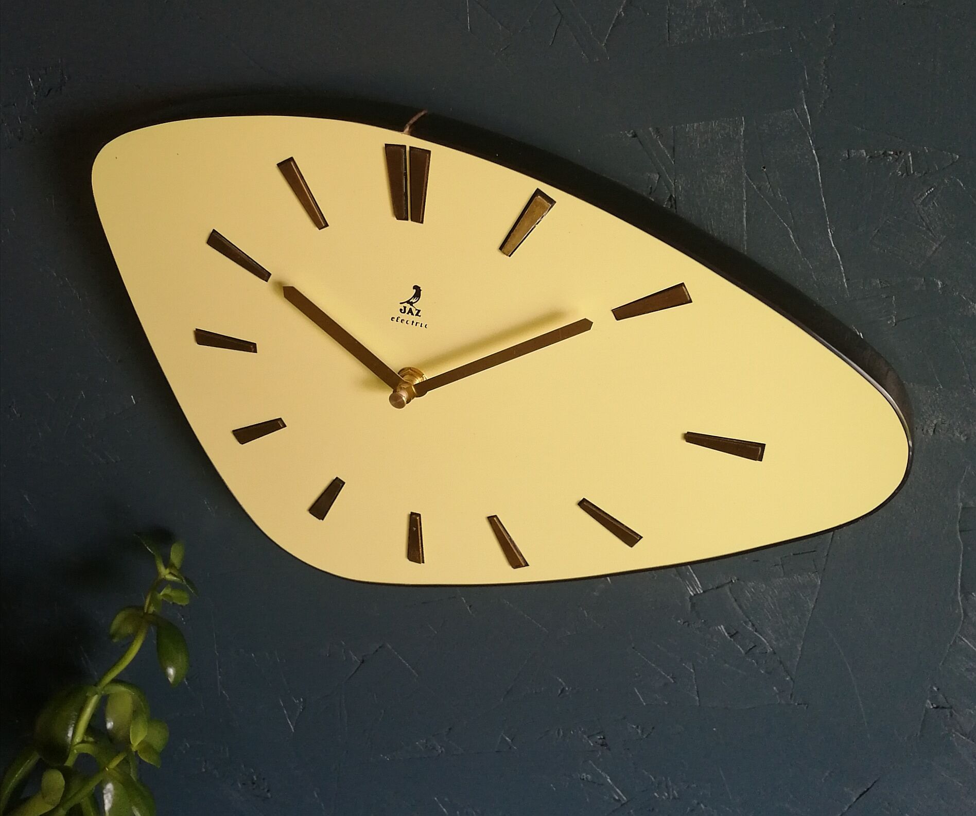 Vintage formica clock asymmetrical silent wall clock "Golden yellow Jaz"