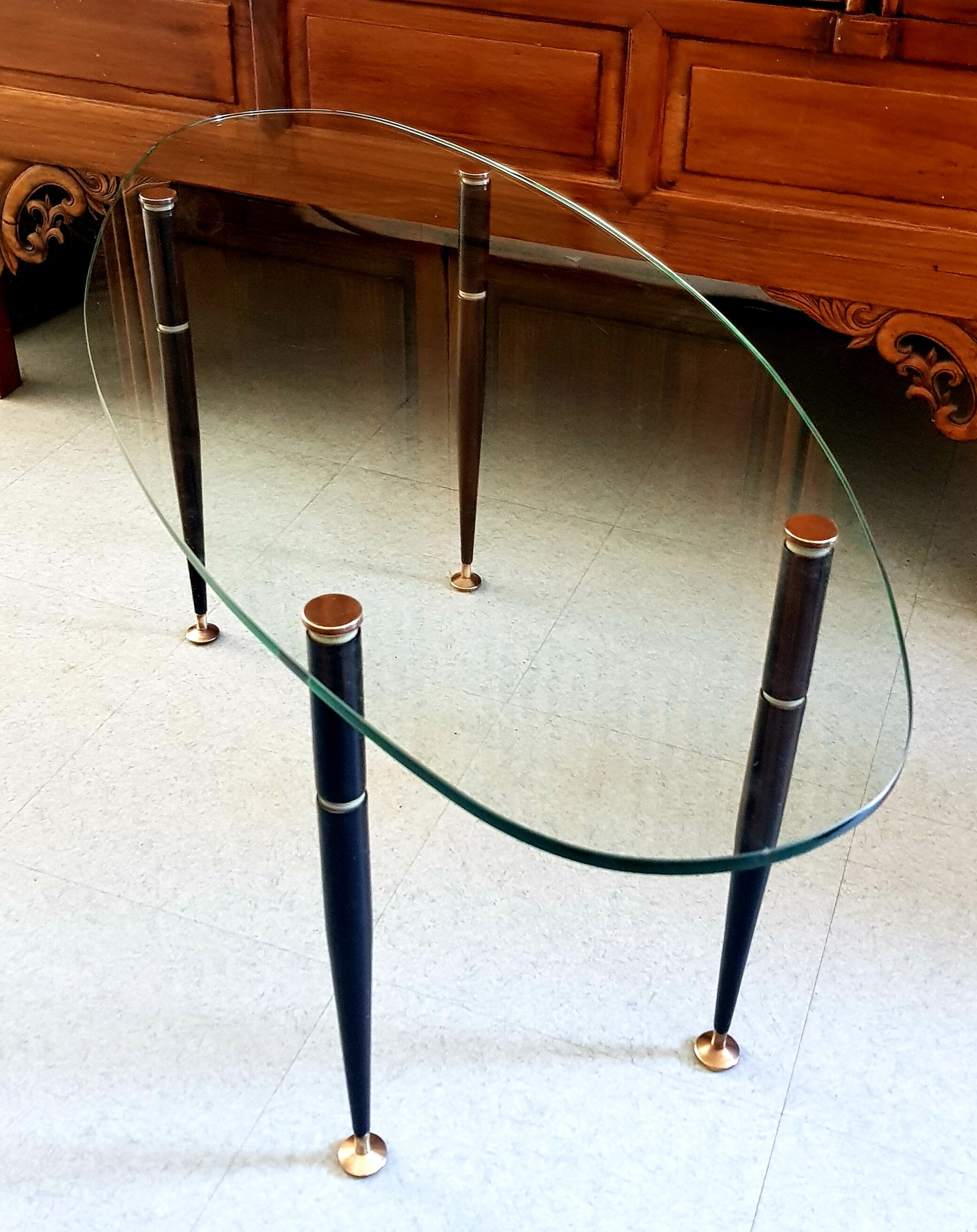 1950 oval coffee table in steel and brass glass