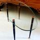 Table basse 1950 ovale en verre acier et laiton