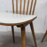 Pair of Baumann Menuet chairs, Honey patina, White vinyl seats