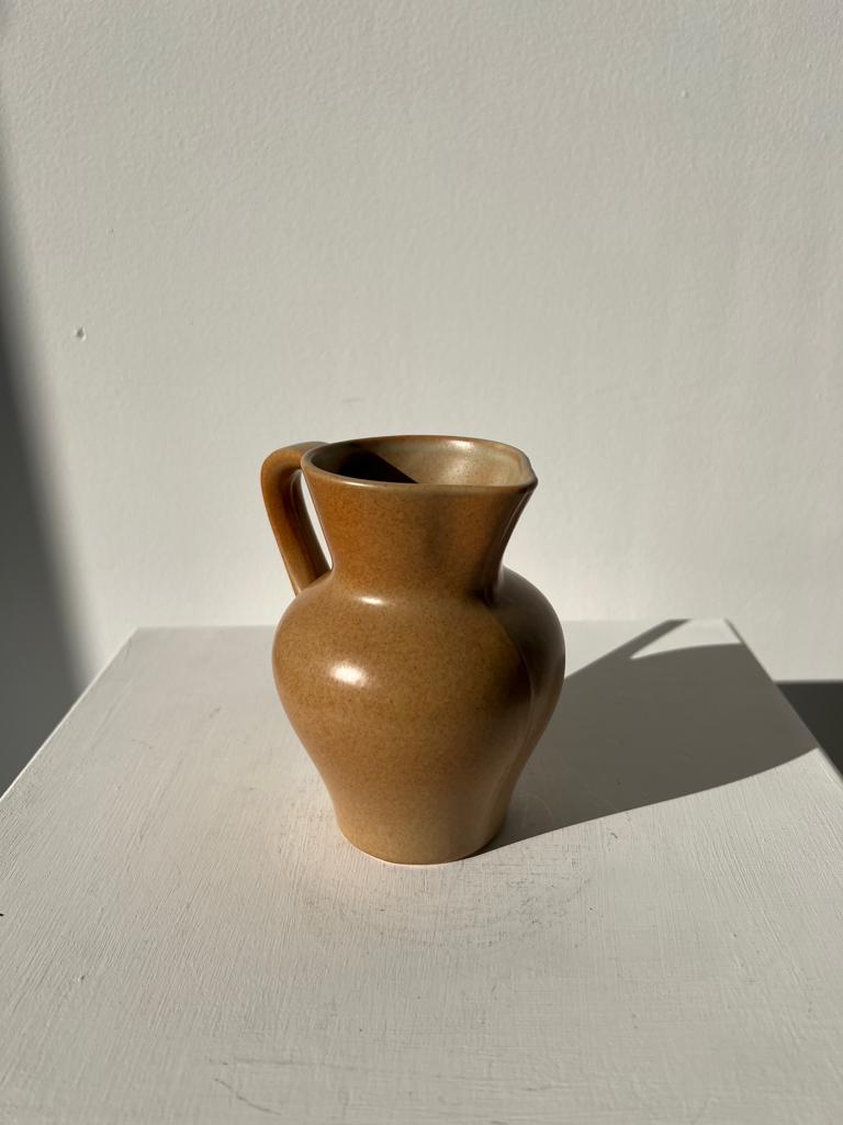 Pitcher in light beige sandstone