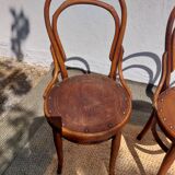 4 curved wooden bistro chairs