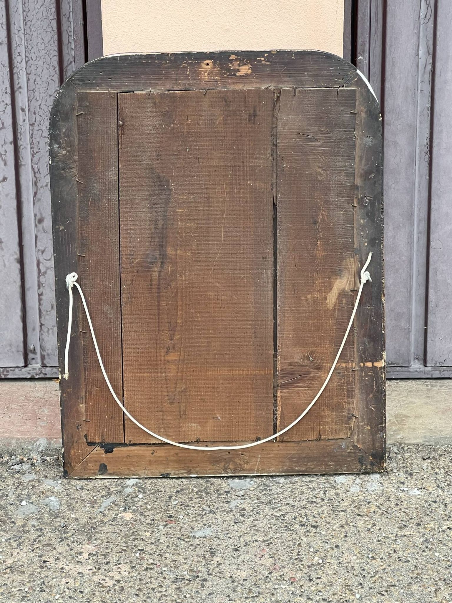 Miroir Louis Philippe en bois doré à frise ajourée