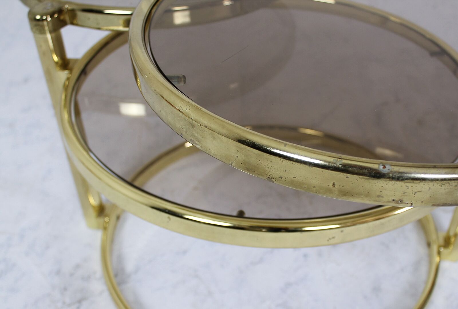 Mid century brass plated 3-tier swivel coffee table after Milo Baughman