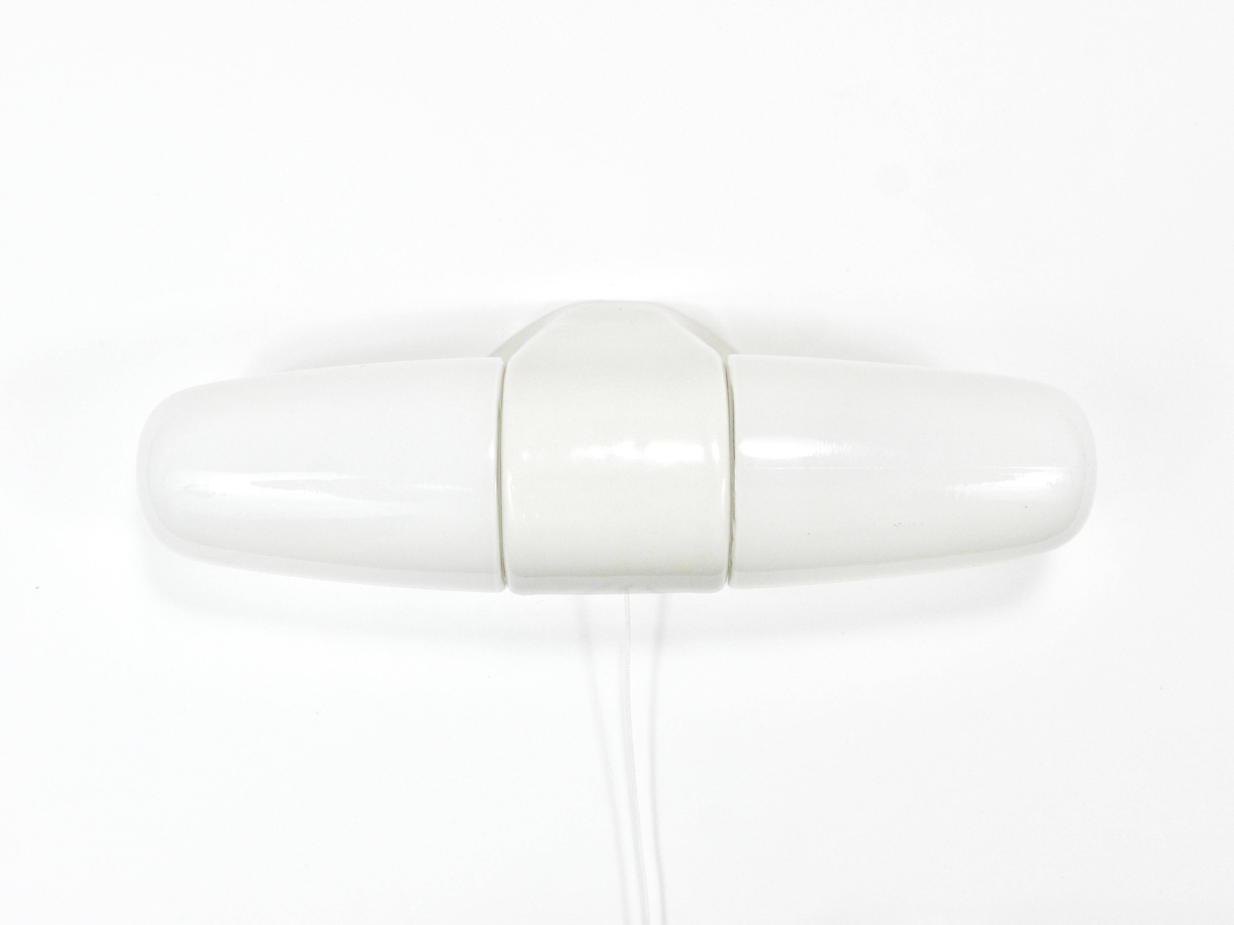 White double wall lamp Bauhaus Wilhelm Wagenfeld, Linder Germany, 1950s