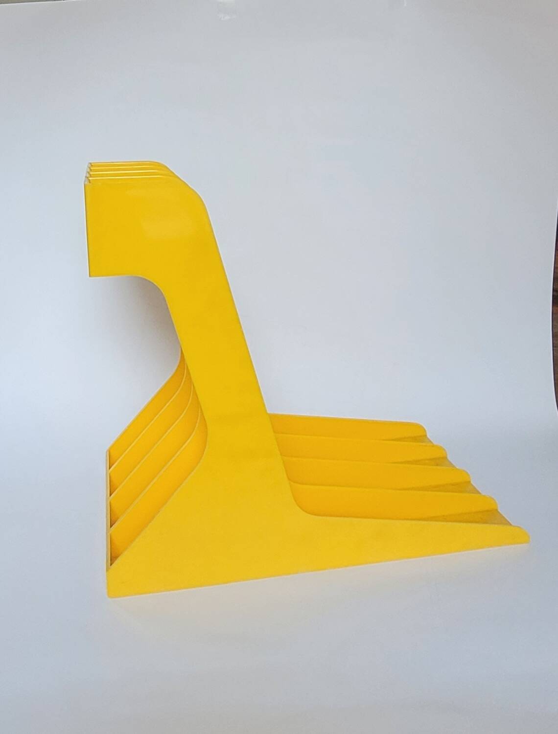 Yellow plastic vinyl racks from the 70s