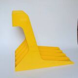 Yellow plastic vinyl racks from the 70s
