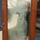 Art Deco door mirror with floral pattern frame