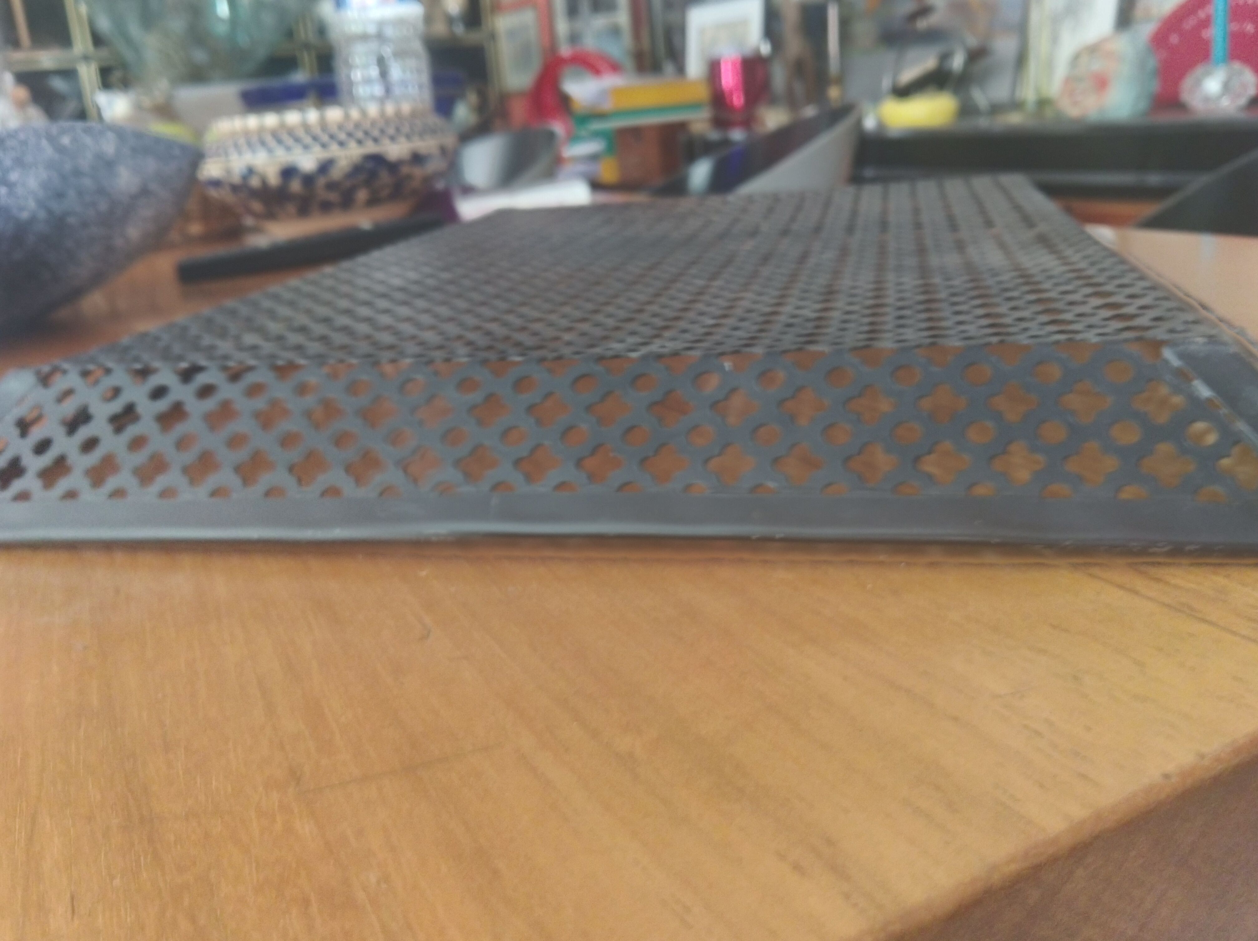 Perforated sheet metal tray, circa 1950