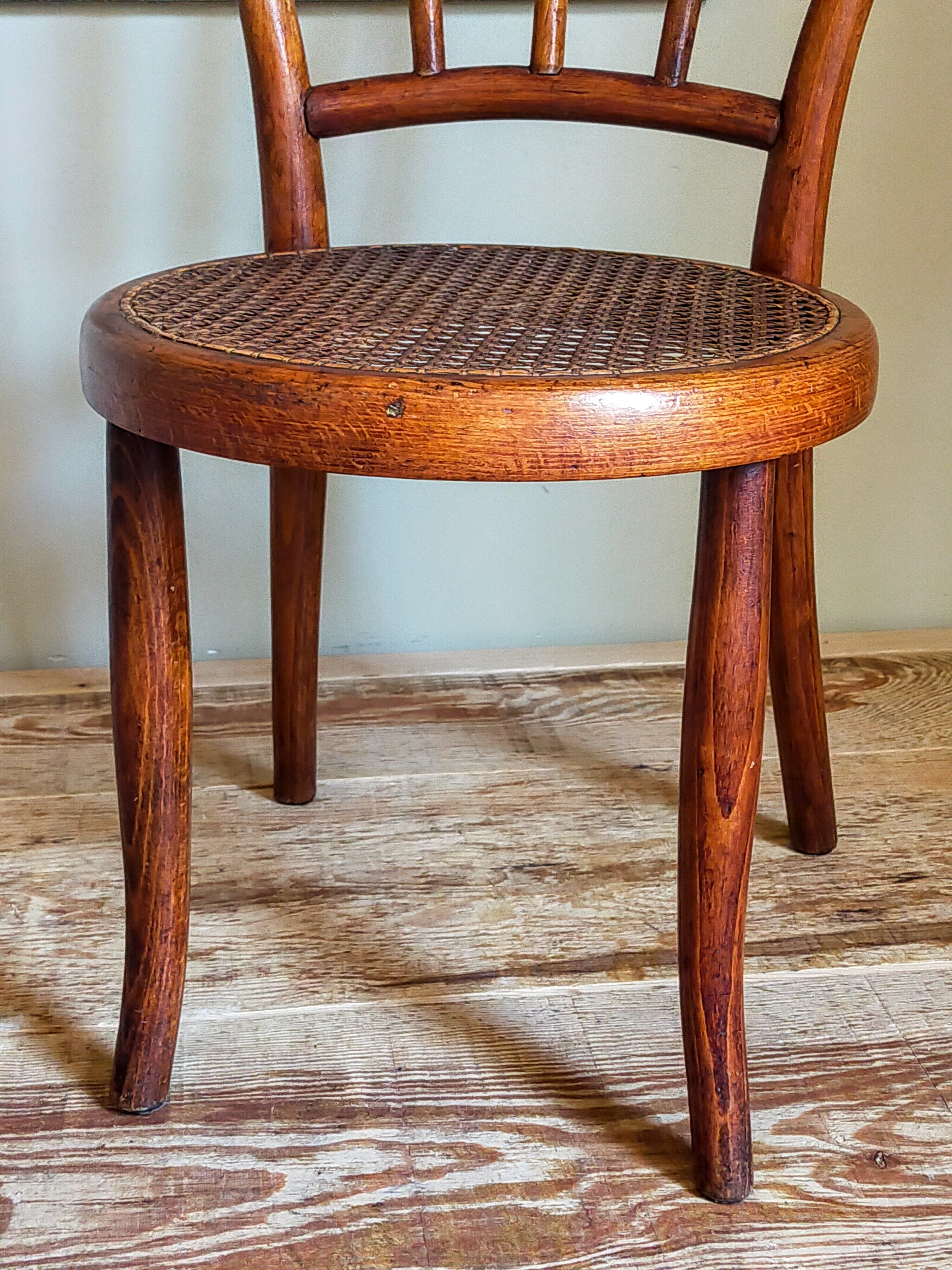 Children's chair in curved round wood old year