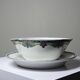 Old Luneville sauce boat, opaque porcelain with polychrome decoration.