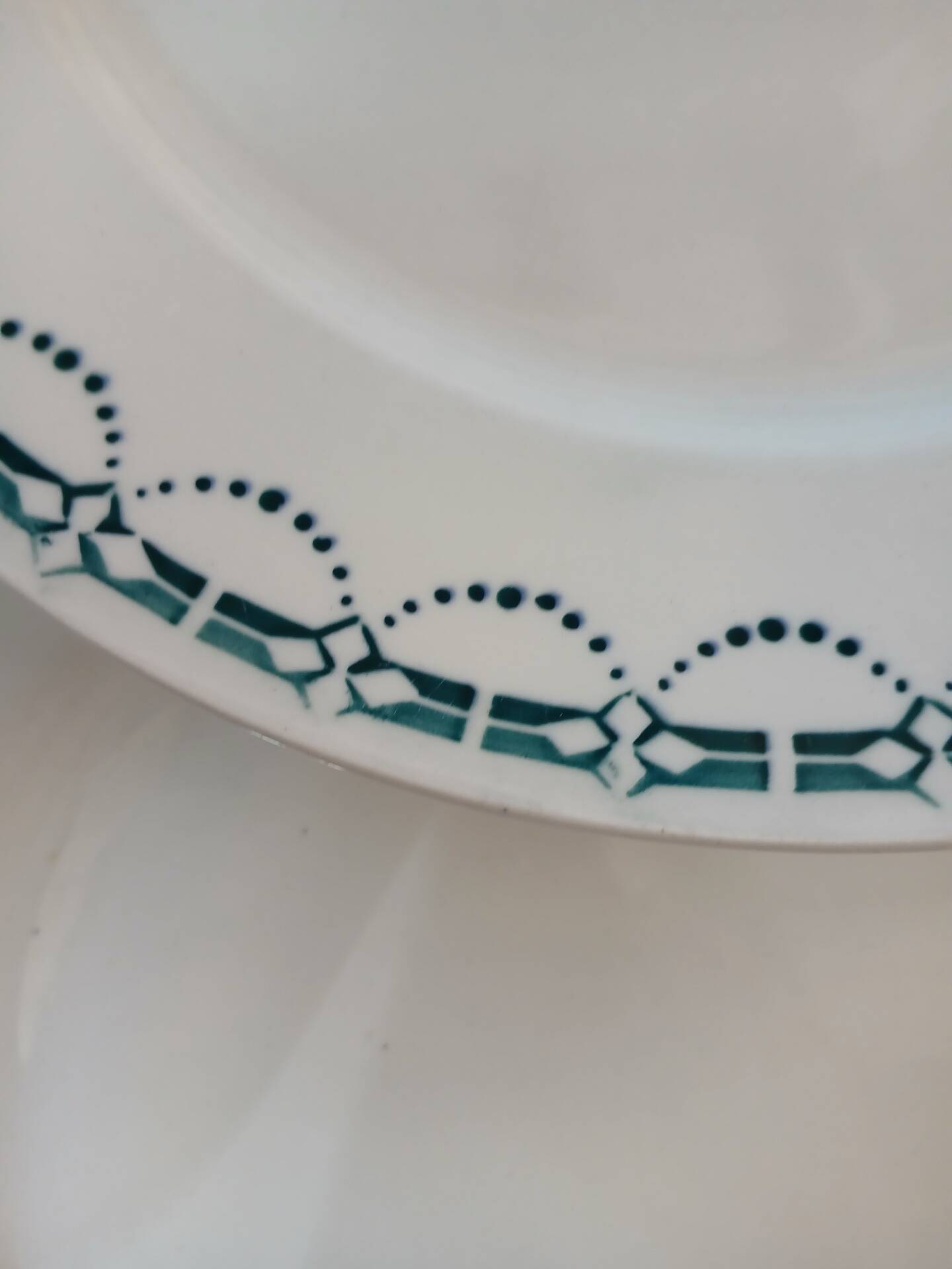 12 flat plates in ironstone from Badonviller
