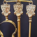 Brass fireplace set with 4 accessories.