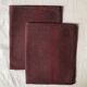 Set of two old tea towels in pure linen tinted in burgundy