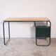 Desk with bauhaus style tubular steel chair
