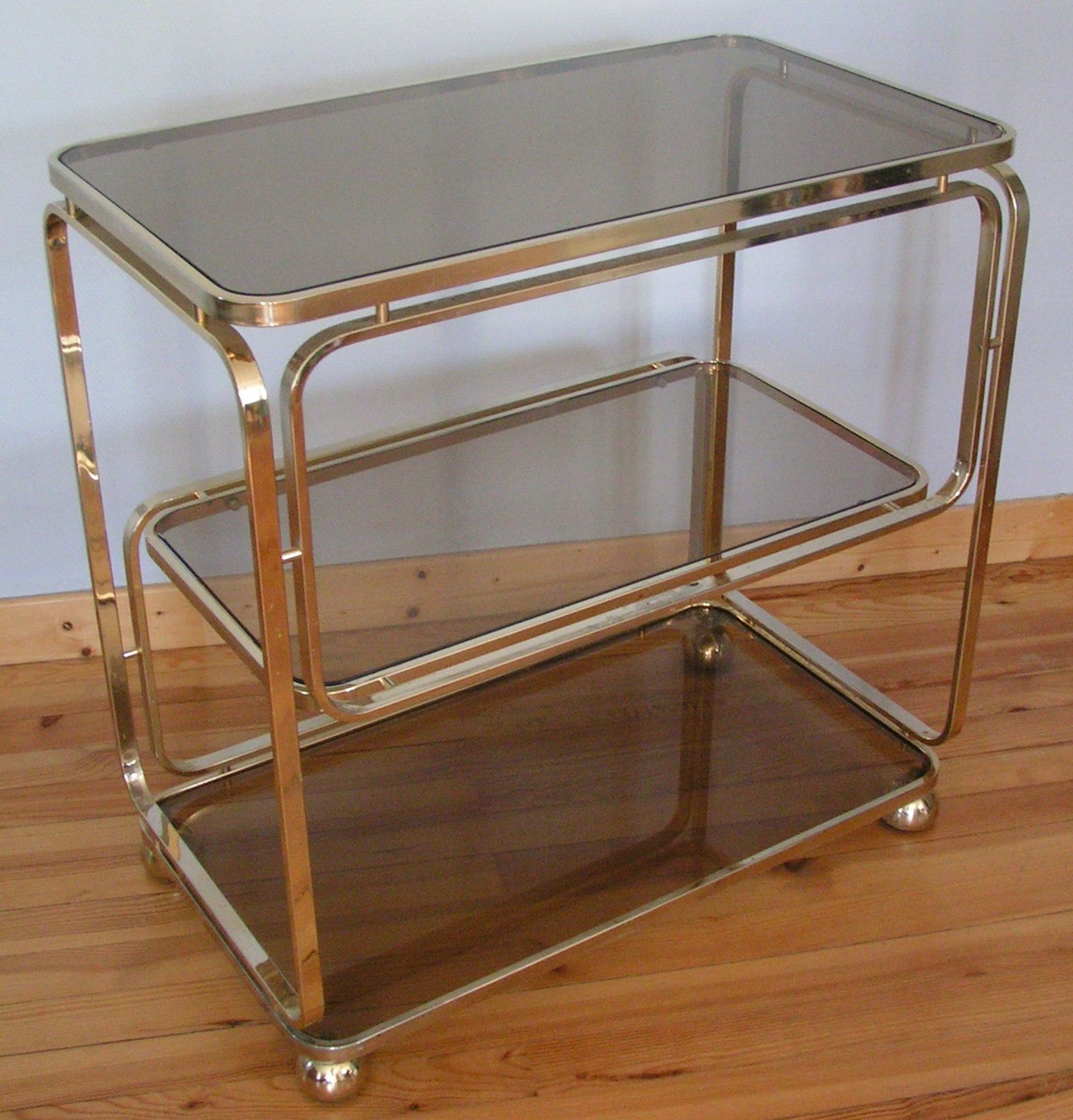 Service on wheels in gold brass and sunglasses - signed
