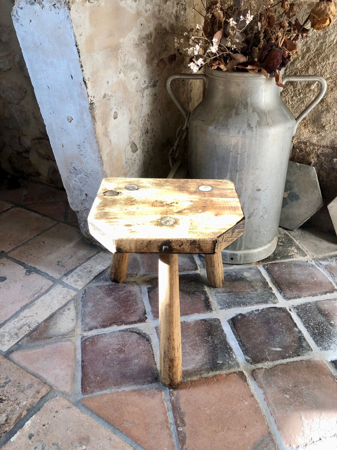 Renovated tripod farm stool
