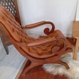 Chesterfield armchair in wood and leather
