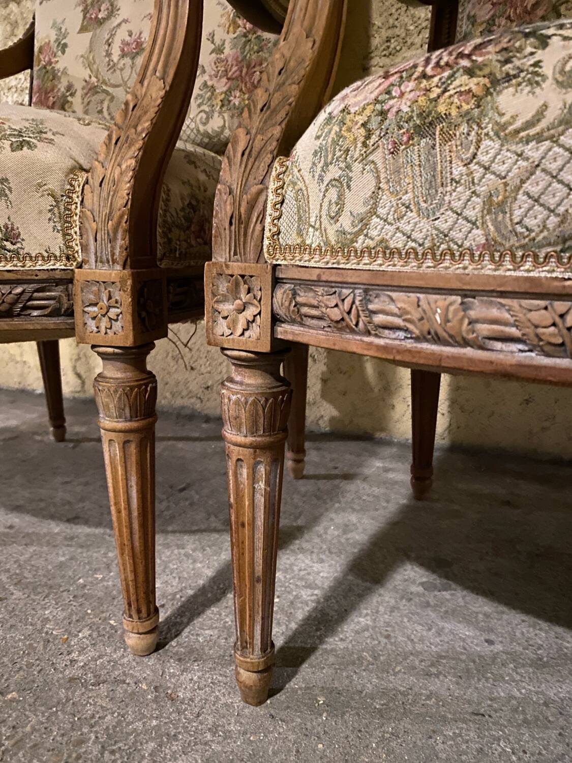 Pair of antique carved wooden armchairs
