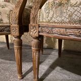 Pair of antique carved wooden armchairs