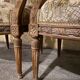Pair of antique carved wooden armchairs