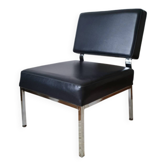 Chromed metal and imitation leather fireside chair from the 1950s