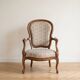 Louis XV cabriolet armchair in wood and beige fabric