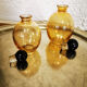 Duo of small amber bottles
