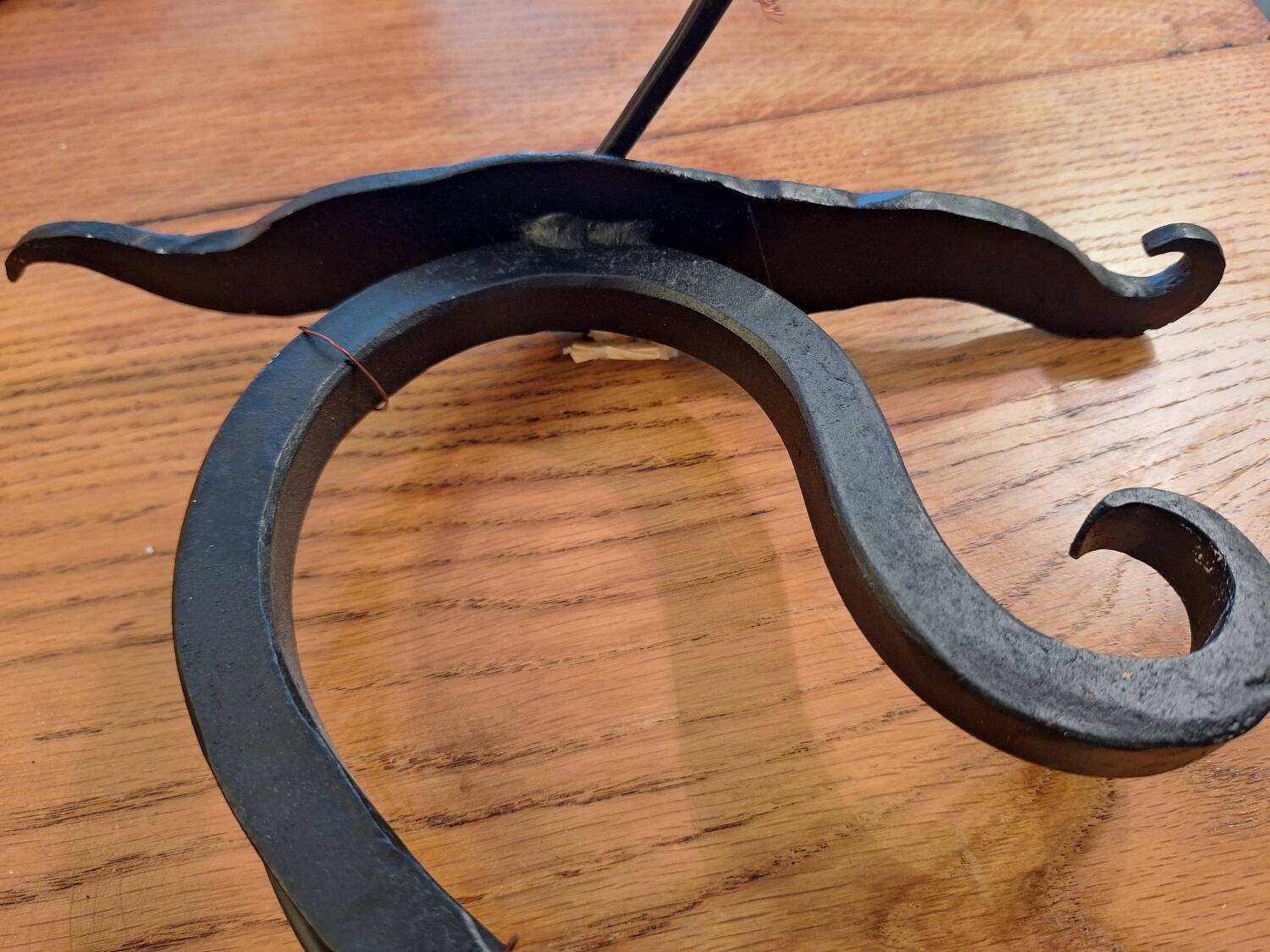 pair of wrought iron animal wall lights