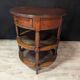 Pair of oval mahogany side tables with caned shelves – 19th century