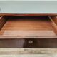Art Deco executive desk in exotic wood, glass, and brass.