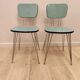 Pair of green Formica chairs with Eiffel legs
