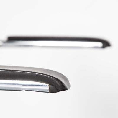 Tubax cantilever chair with black armrest