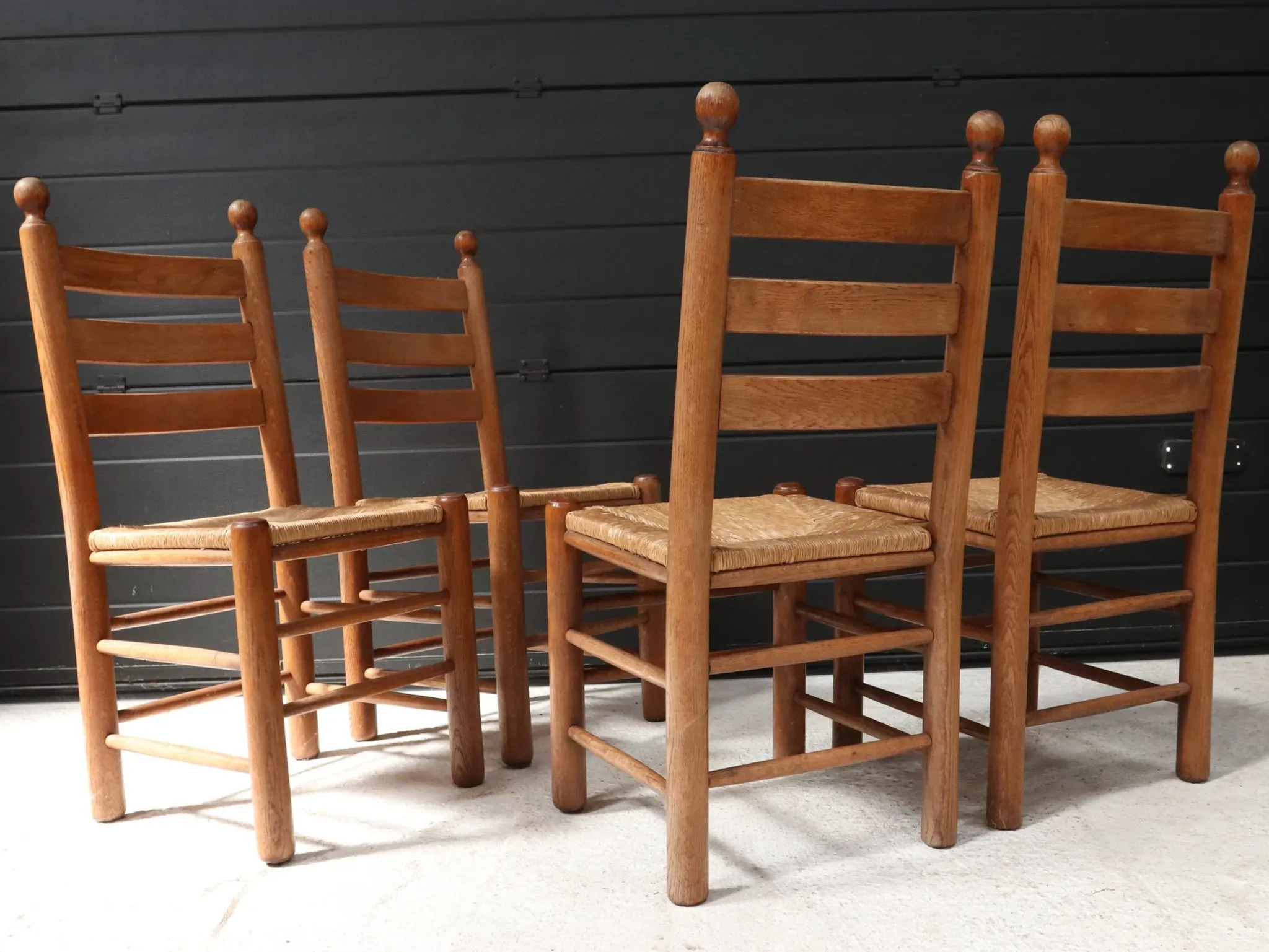 Set of four French ladderback chairs with rush seats – circa 1960