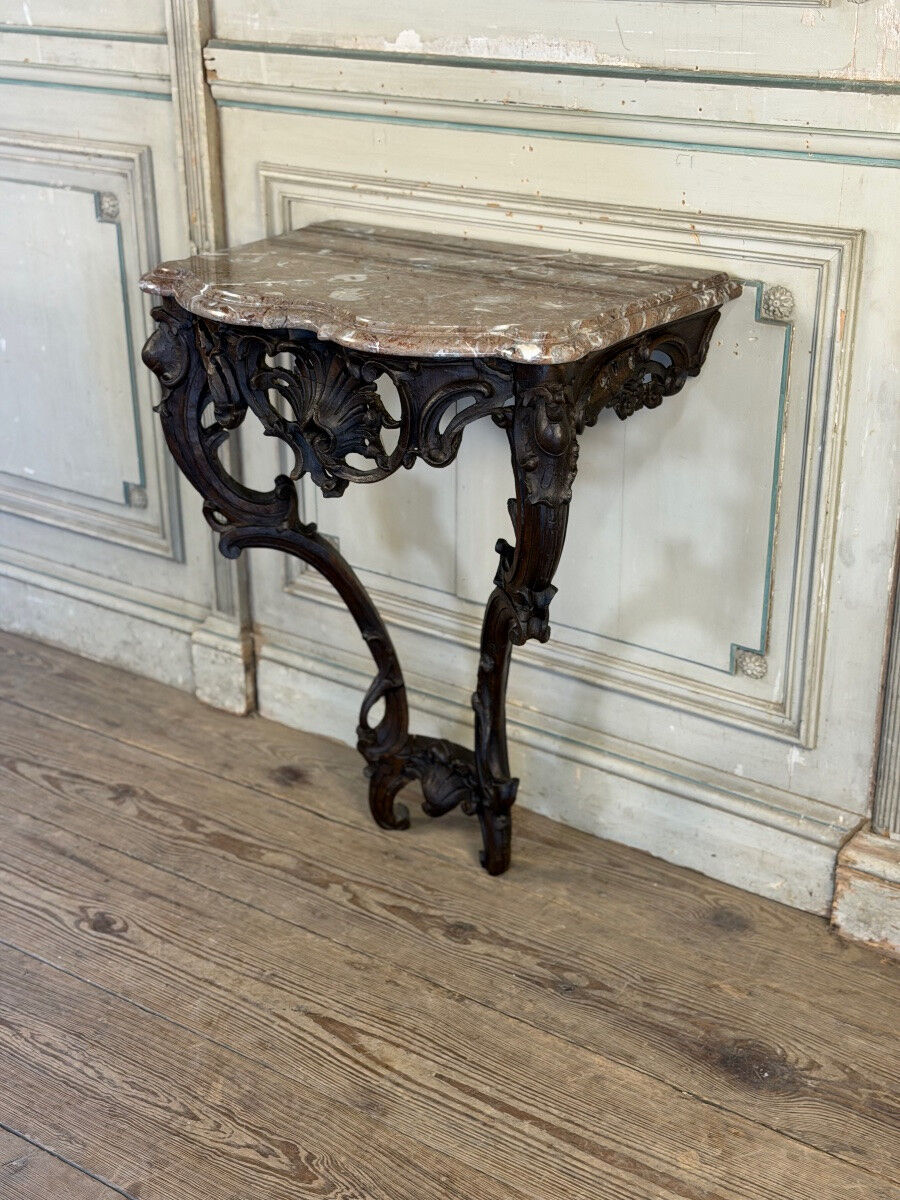 Console Louis XV en chêne sculpté, patine noire, XVIIIeme siècle
