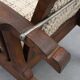 Arts & Craft oak armchair with spindle sides and tweed upholstery, Belgium
