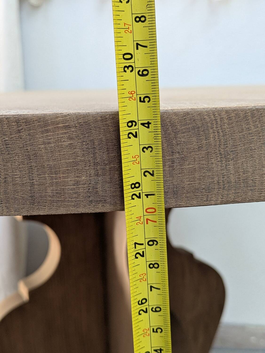 Round table in raw oak