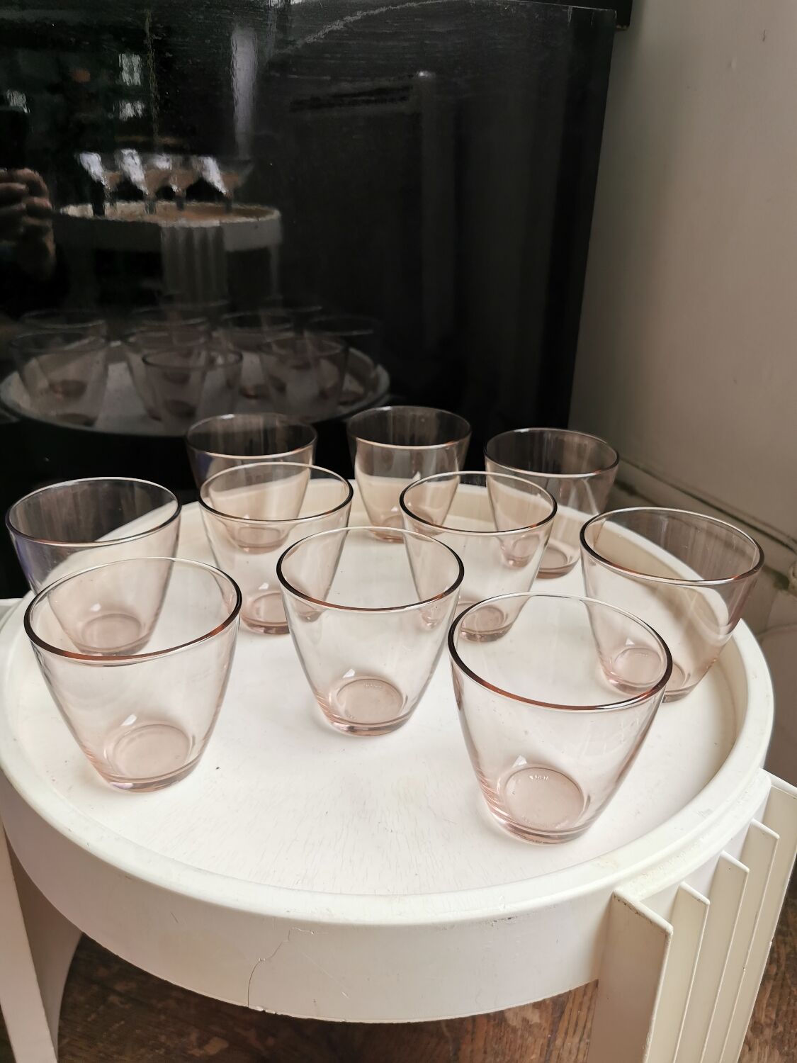 10 glasses of pink amber water