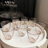 10 glasses of pink amber water