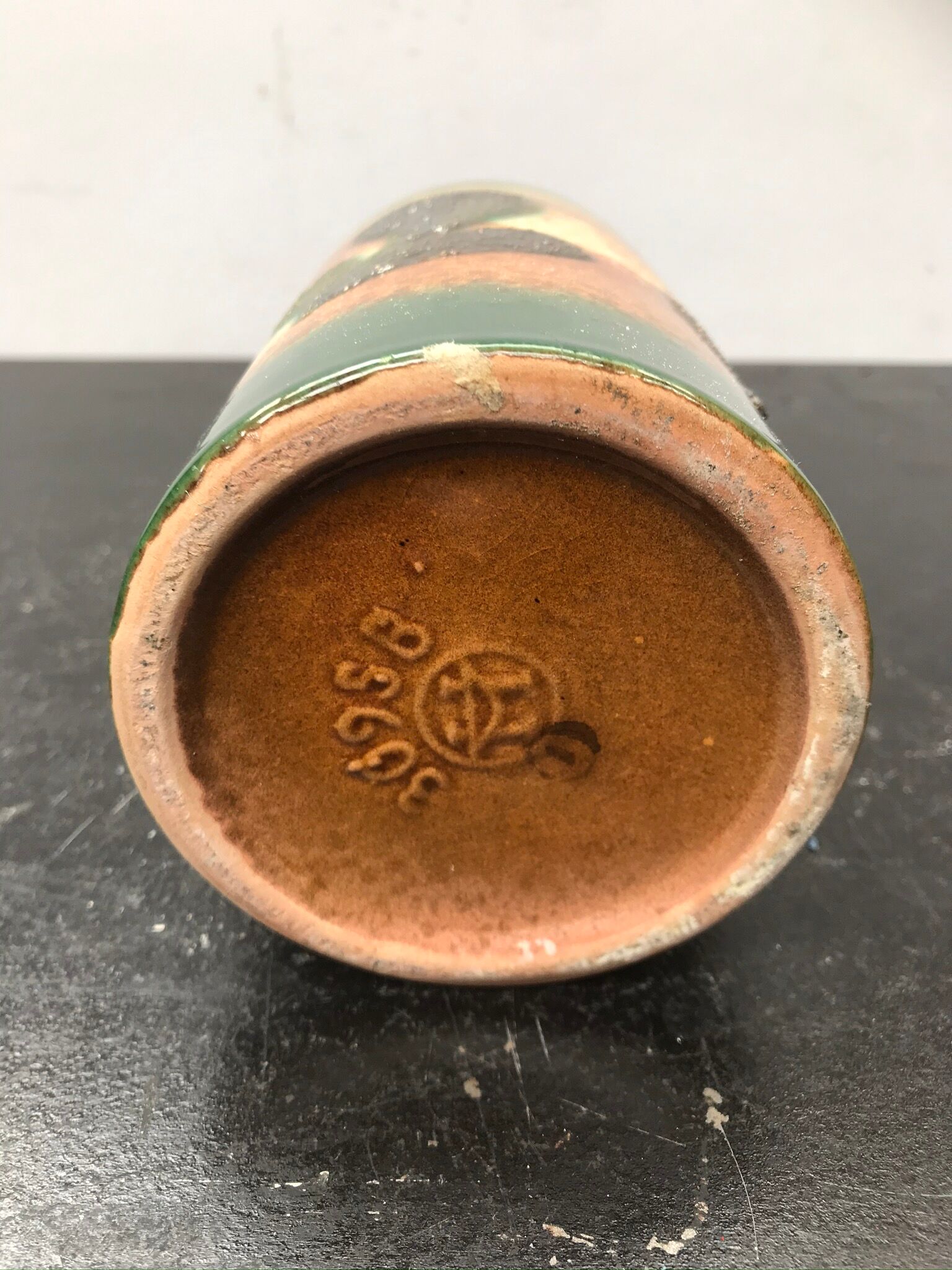 Old vase shape green ceramics bottle - vintage brown