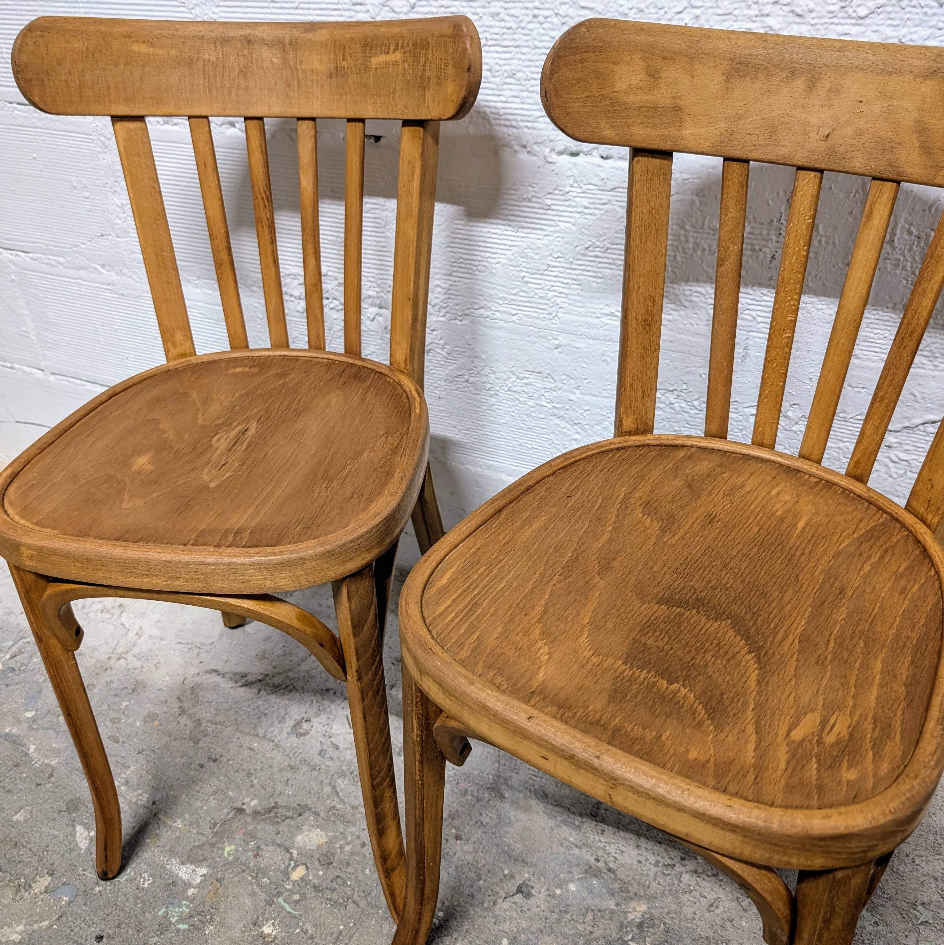 Duo of Baumann bistro chairs N°108