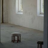A hexagonal oak stool, seat refurbished in lambswool, Danish design from the 1950s.