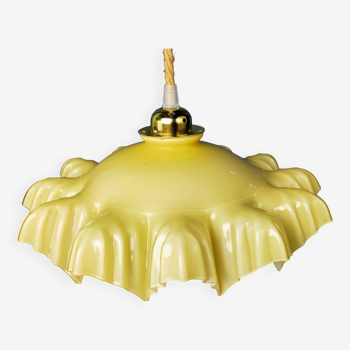 Suspension with draped yellow glass lampshade