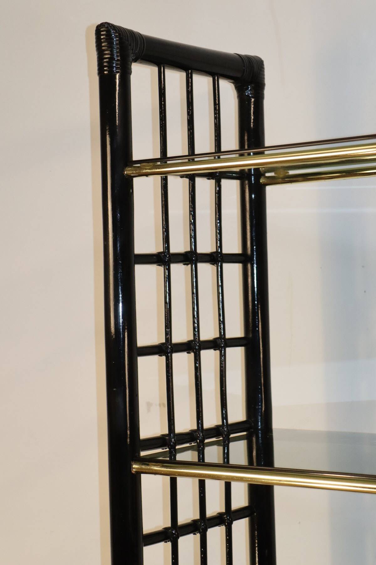 Vintage 1970s shelf in smoked glass with a bamboo-style structure.